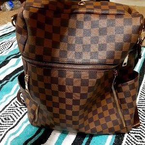 Brown checkered purse back pack
